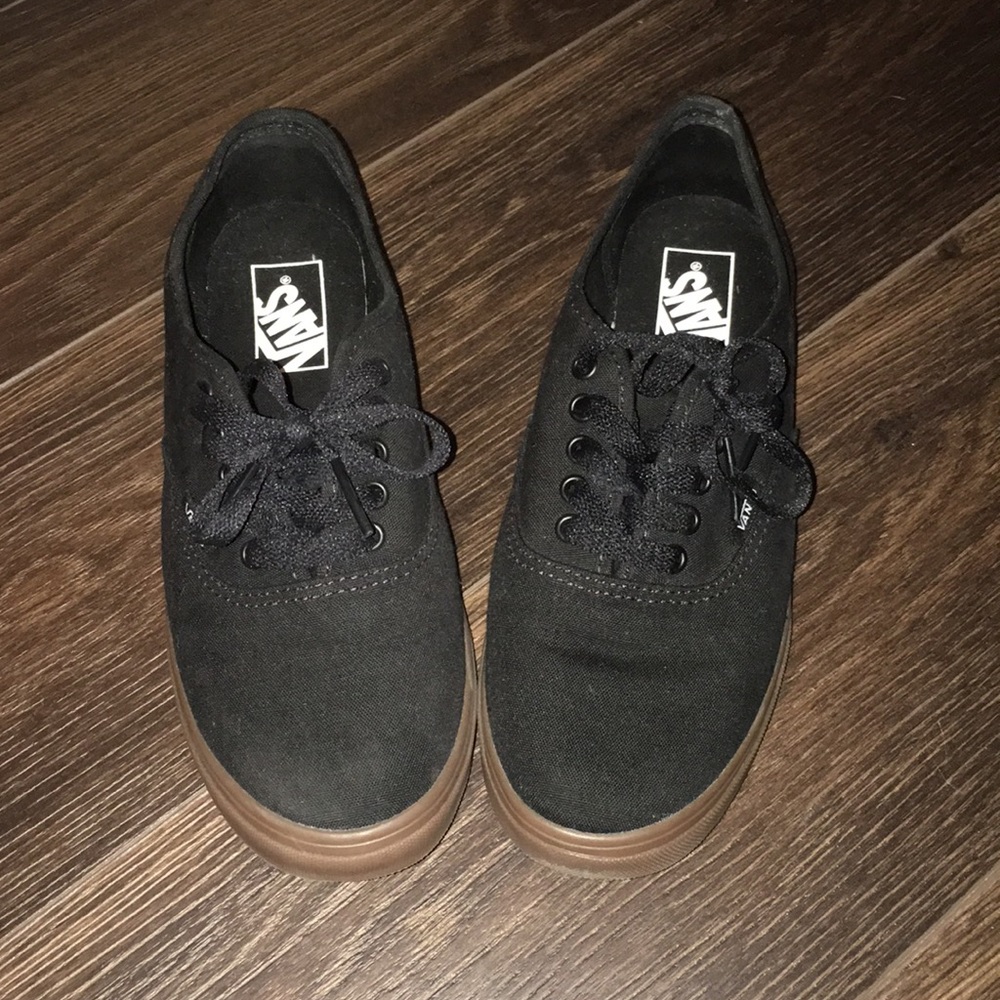 Black with gum sole. Low pros